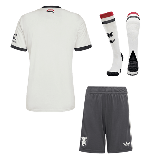 Kit de fútbol de visitante del Manchester United (camiseta, pantalón corto y calcetines)