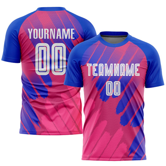 Camiseta de fútbol personalizada de sublimación en rosa, blanco y azul marino.