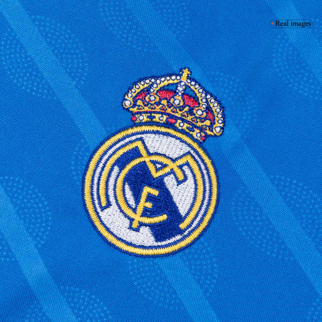 Kit de camiseta de fútbol de la tercera equipación del Real Madrid 2025/26 para niños