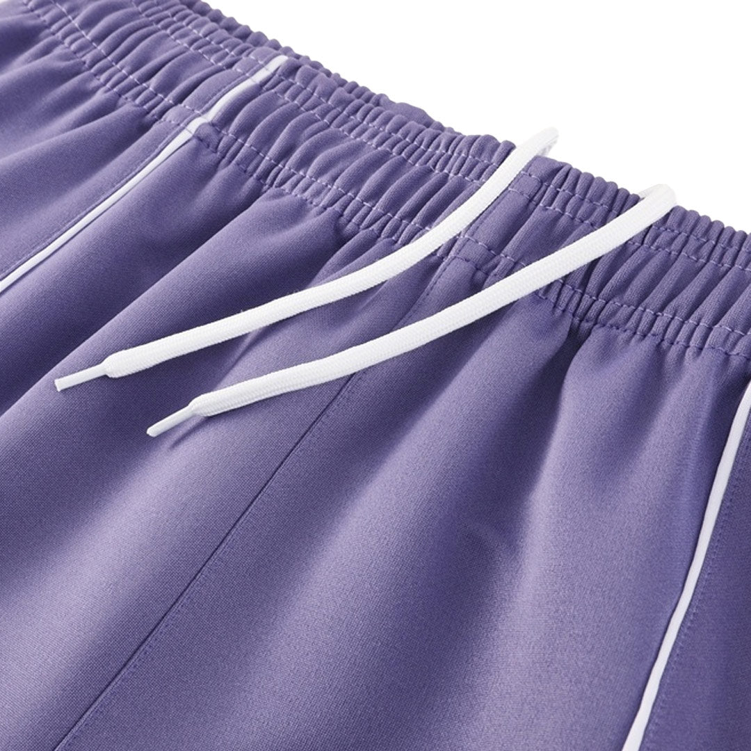Kit de entrenamiento del Manchester United 25/26 (Chaqueta + Pantalones) Morado