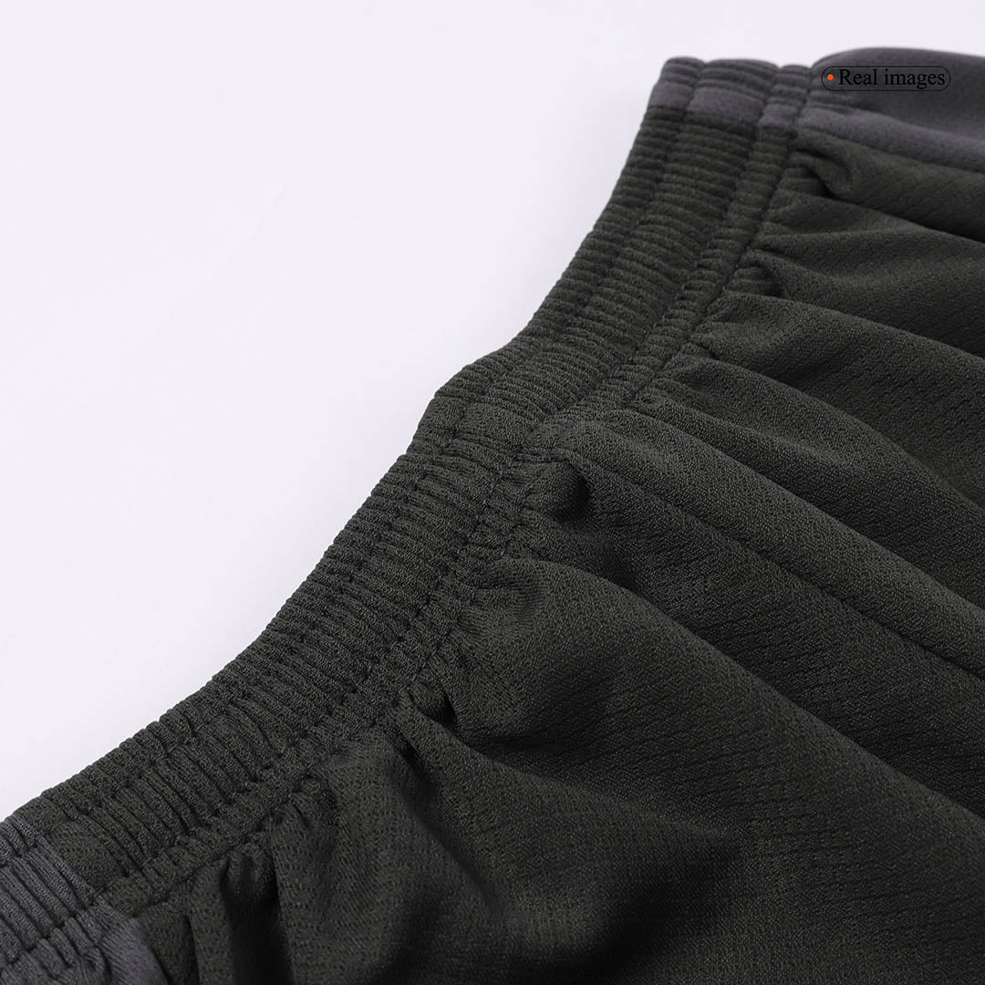 Kit de fútbol visitante del Liverpool para niños (camiseta y pantalón corto)
