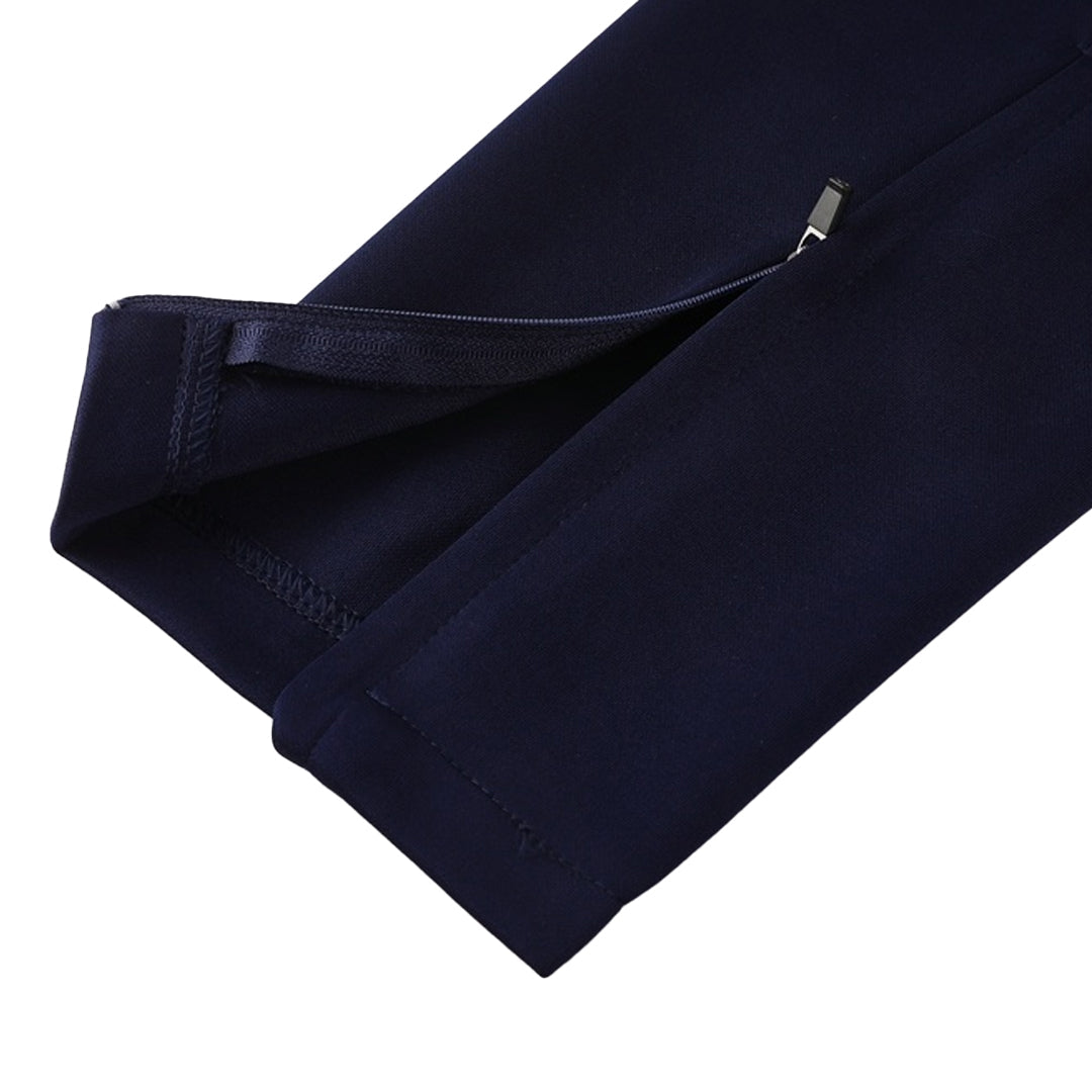 Kit de entrenamiento del Barcelona 25/26 (Chaqueta + Pantalón) Azul Marino y Naranja