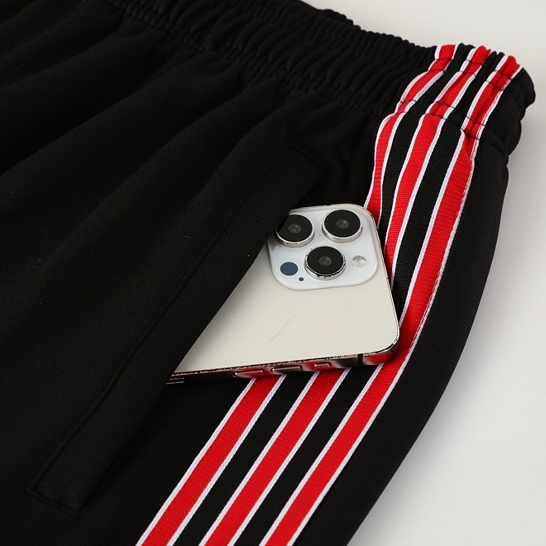 Kit de entrenamiento del Manchester United 2025/26 (Chaqueta + Pantalones)