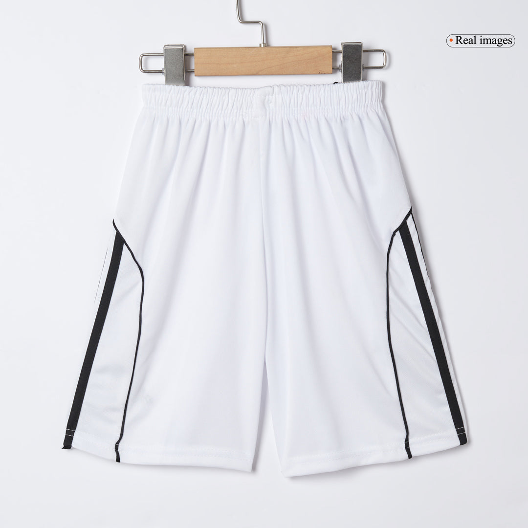 Kit de fútbol local del Manchester United para niños (Kit, pantalón corto y calcetines) 2025/26