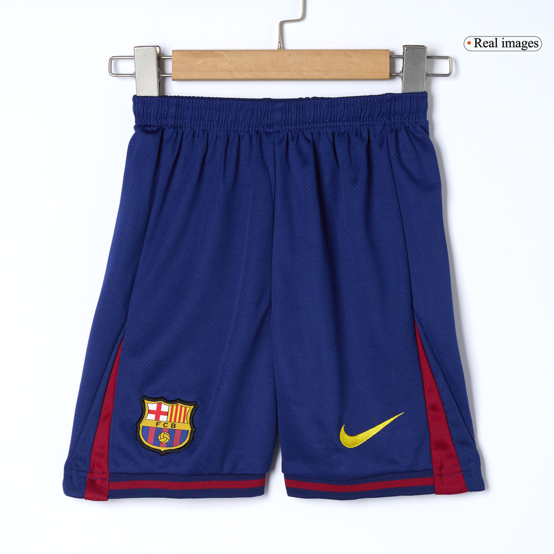 Kit de fútbol local del Barcelona para niños (camiseta, pantalón corto y calcetines) 2025/26 (rojo y azul)