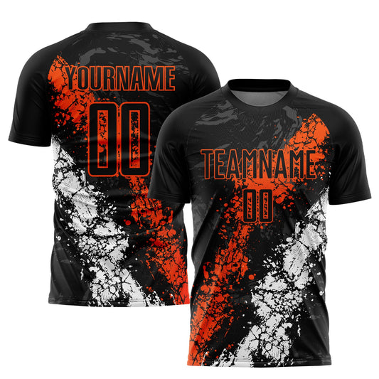 Camiseta de fútbol personalizada con sublimación en negro, naranja y blanco