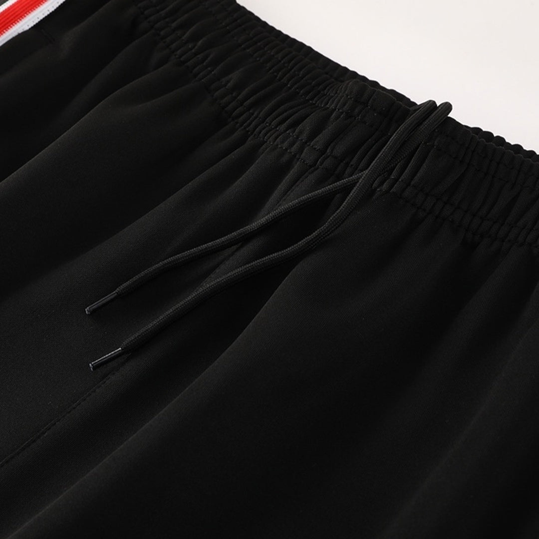 Kit de entrenamiento del Manchester United 2025/26 (Chaqueta + Pantalones)