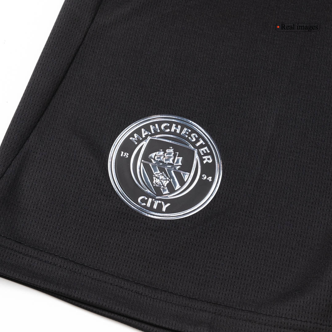 Kit de visitante del Manchester City (camiseta, pantalón corto y medias) 2025/26
