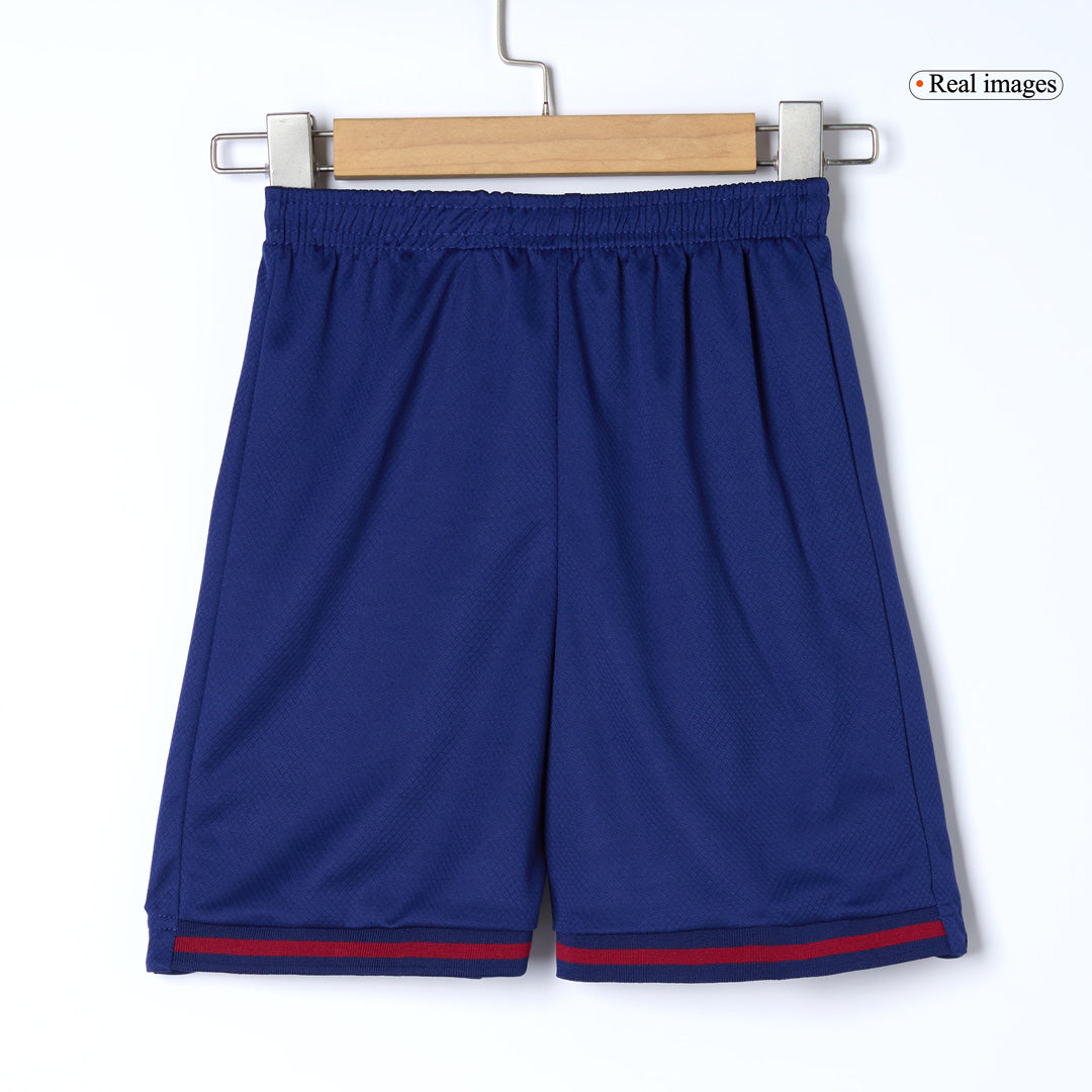 Kit de fútbol local del Barcelona para niños (camiseta, pantalón corto y calcetines) 2025/26 (rojo y azul)