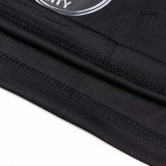 Kit de visitante del Manchester City (camiseta, pantalón corto y medias) 2025/26