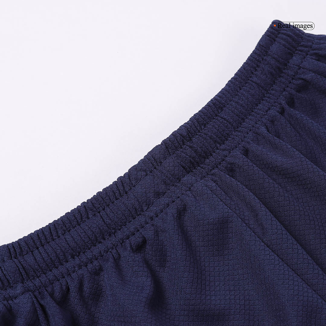 Kit de fútbol infantil del Barcelona (camiseta y pantalón corto) 2024/25 con el logotipo de Spotify sin texto