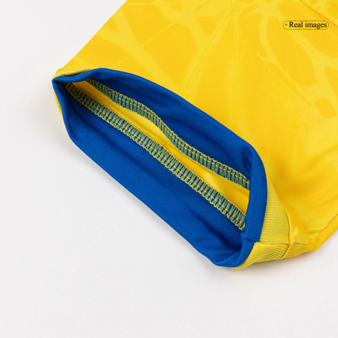 Equipación infantil de la selección colombiana (camiseta + pantalón corto) para el Mundial 2026
